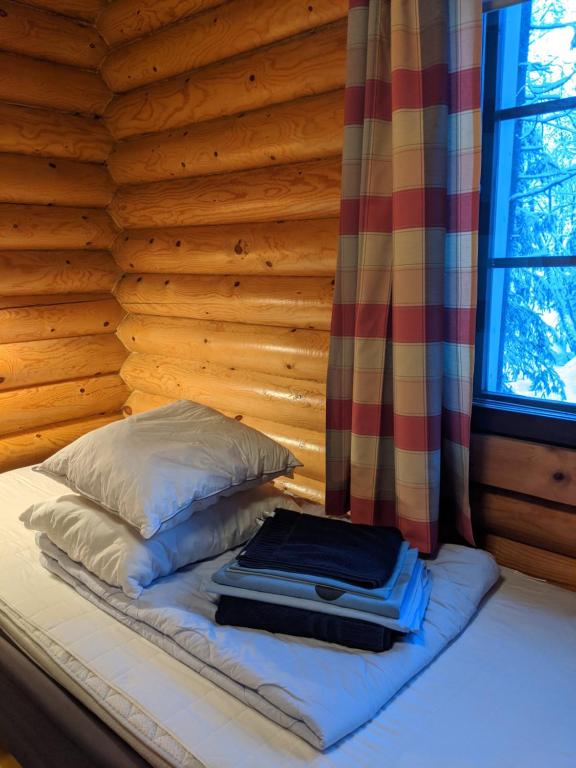 Postel nebo postele na pokoji v ubytování Tunturioravat