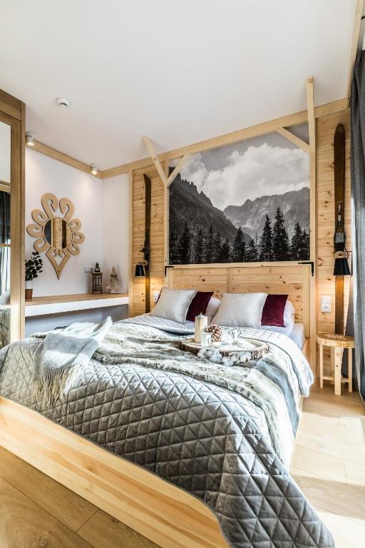 Posteľ alebo postele v izbe v ubytovaní Apartamenty Royal Resort Spa