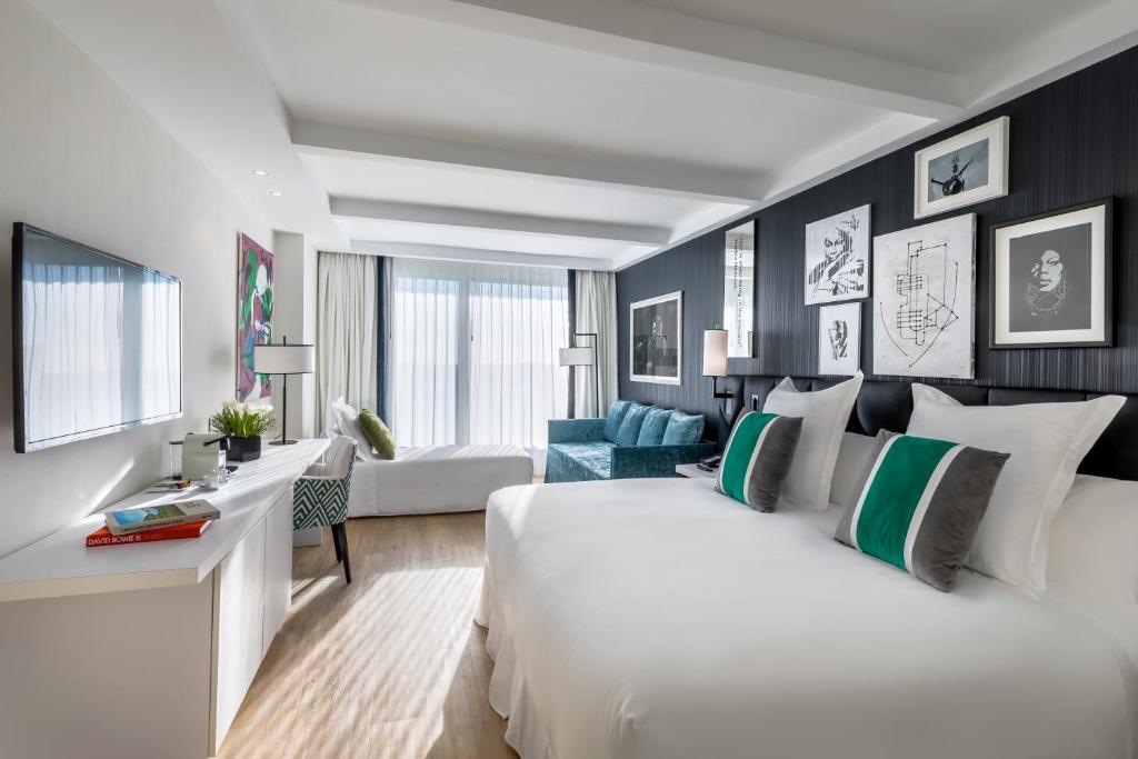 Postel nebo postele na pokoji v ubytování Barceló Imagine