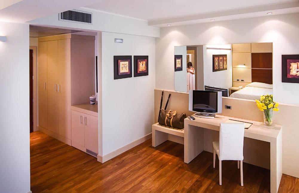 Telewizja i/lub zestaw kina domowego w obiekcie Hotel Europa