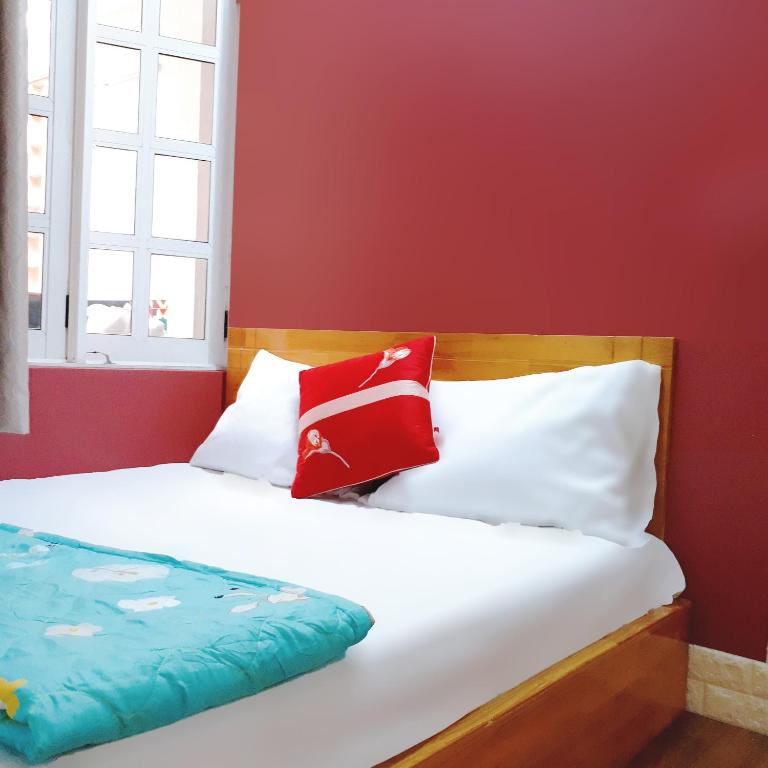 Postel nebo postele na pokoji v ubytování Forget Me Not Hotel