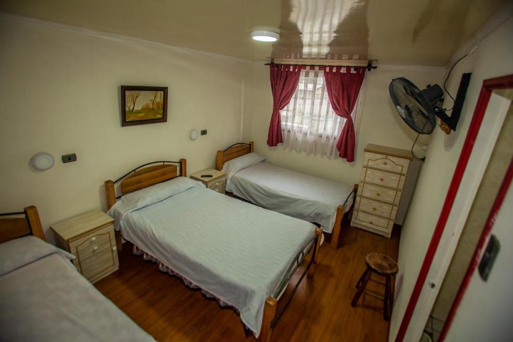 Cama o camas de una habitación en Residencial la Cabaña
