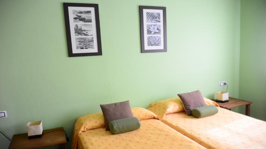Postel nebo postele na pokoji v ubytování Apt. Passiflora 1B