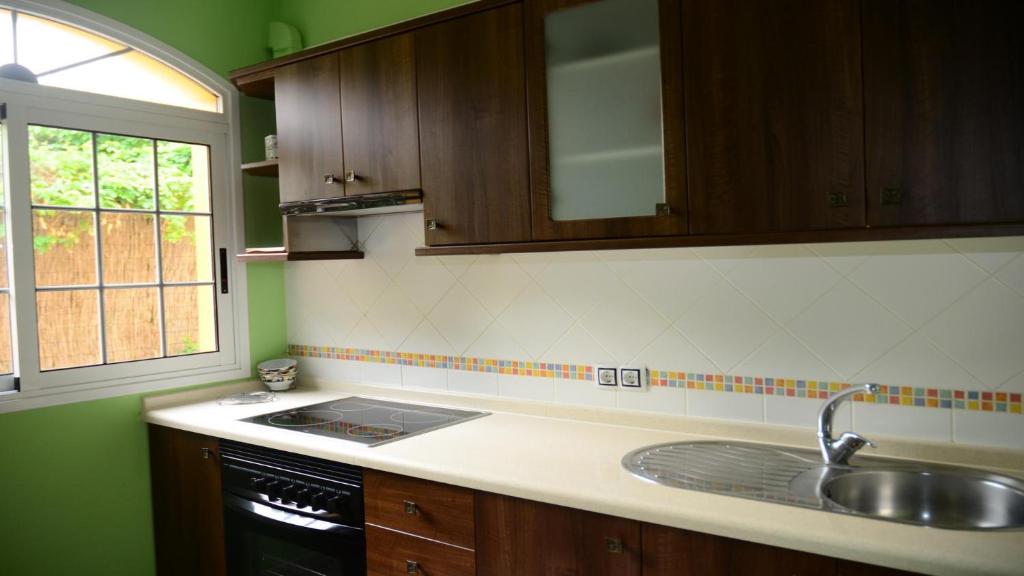 Kuchyň nebo kuchyňský kout v ubytování Apt. Passiflora 1B