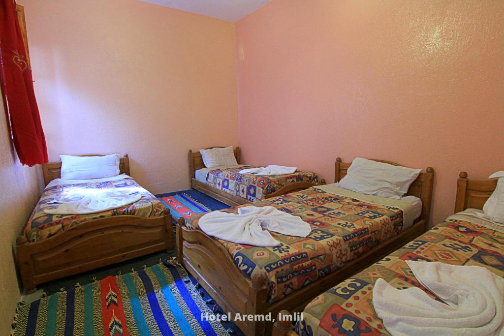 Postel nebo postele na pokoji v ubytování Hotel Igoudar Armed