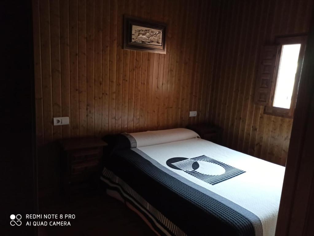 Postel nebo postele na pokoji v ubytování Casa Penelas