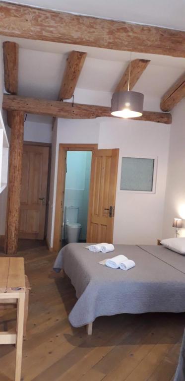 Postel nebo postele na pokoji v ubytování Bapsha Guesthouse