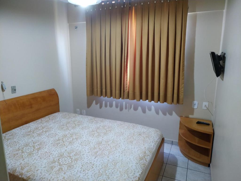 Kama o mga kama sa kuwarto sa Sol das Caldas - Apartamento - ap806 bloco 1