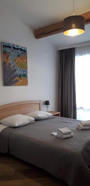 Postel nebo postele na pokoji v ubytování Bapsha Guesthouse