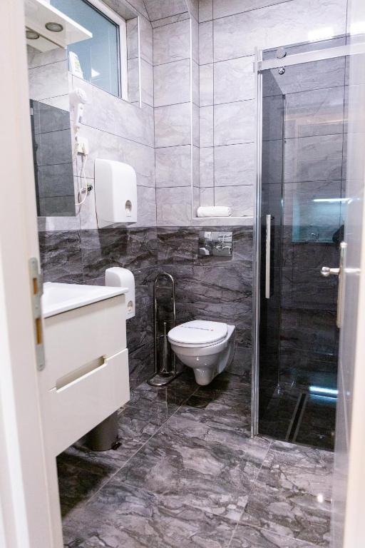 Koupelna v ubytování SPA Apartment Nalis
