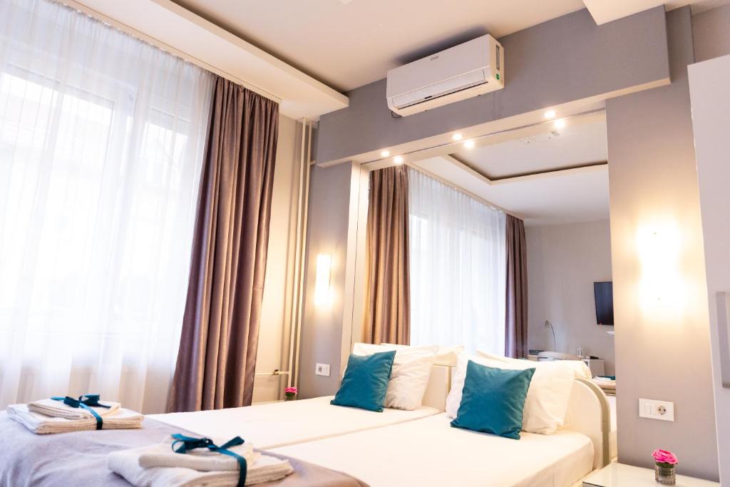 Postel nebo postele na pokoji v ubytování SPA Apartment Nalis