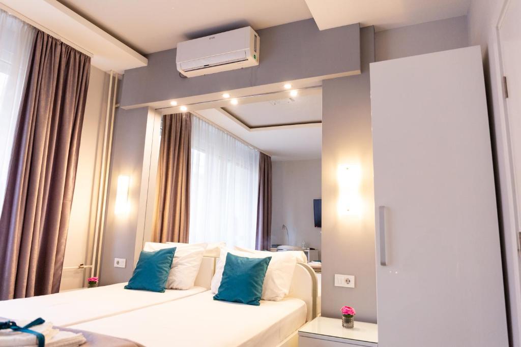 Postel nebo postele na pokoji v ubytování SPA Apartment Nalis