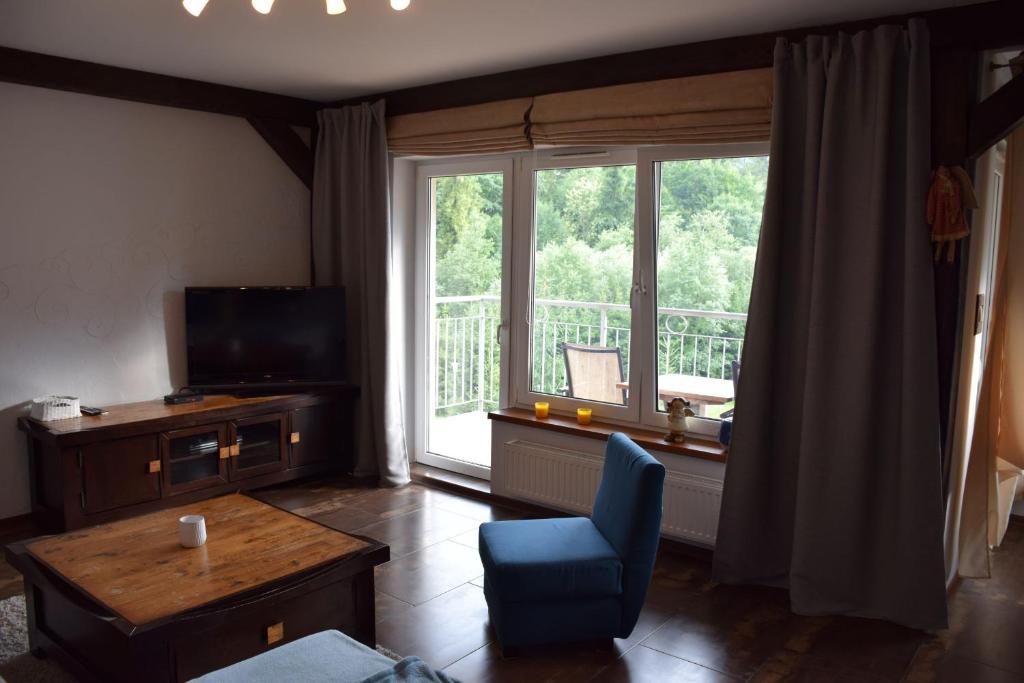 TV a/nebo společenská místnost v ubytování Apartamenty Bukowa Wisła