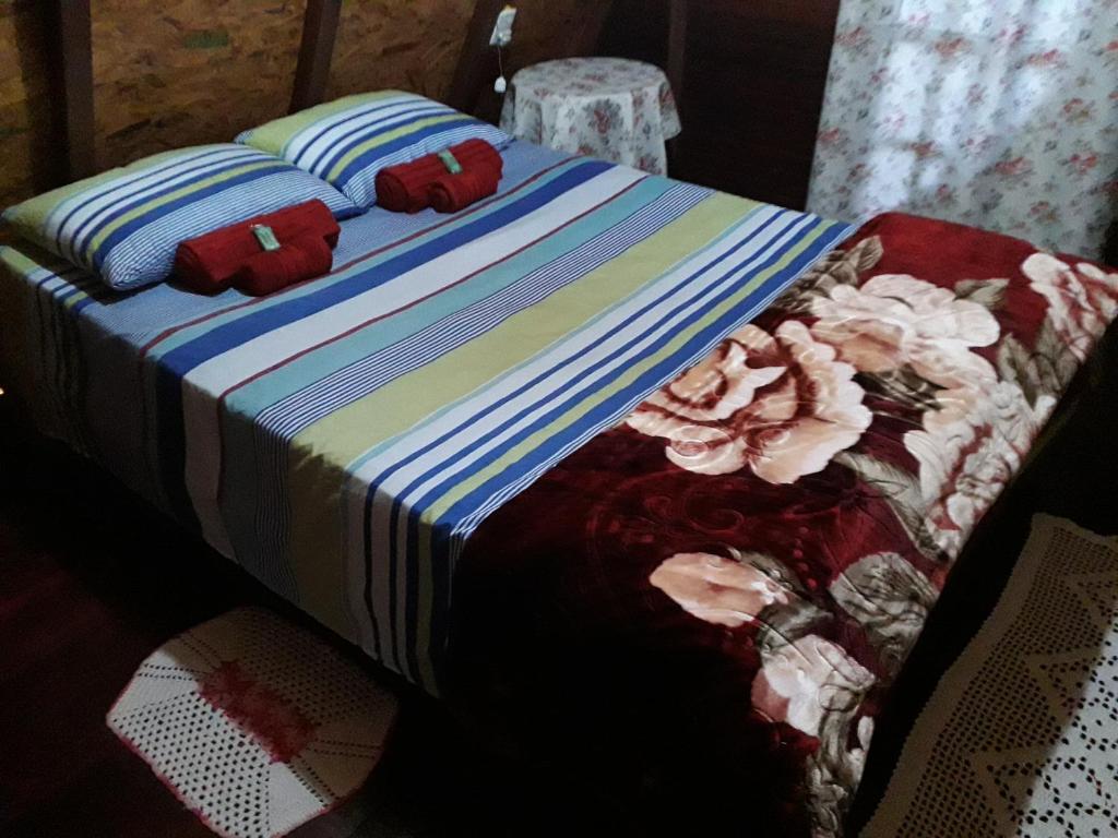 Postel nebo postele na pokoji v ubytování Recanto Mauá - Chalé Amor Perfeito