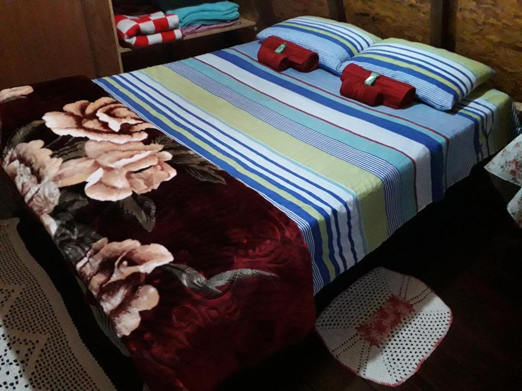 Postel nebo postele na pokoji v ubytování Recanto Mauá - Chalé Amor Perfeito