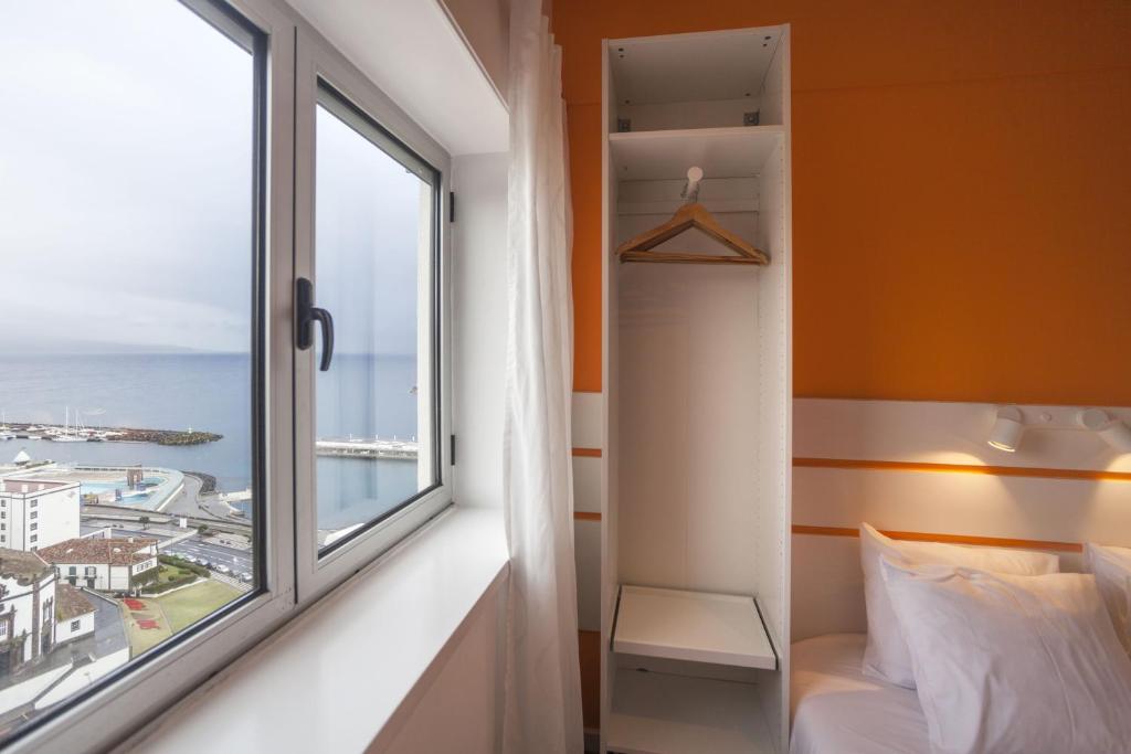 Postel nebo postele na pokoji v ubytování Atlantic Home Azores