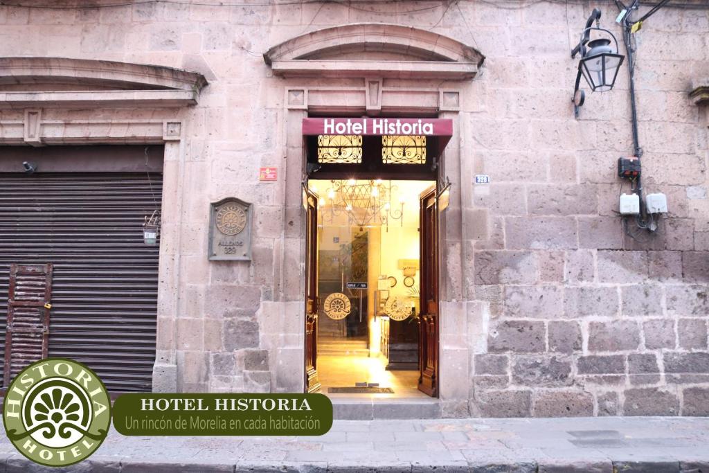 a store front of a building with a door at Hotel Historia in Morelia