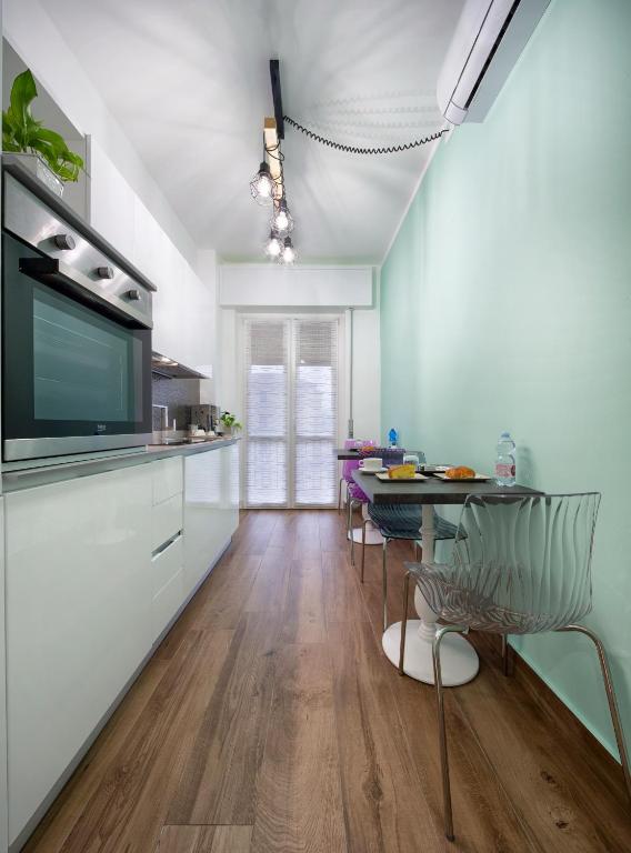 Kuchyň nebo kuchyňský kout v ubytování B&B Campari 10