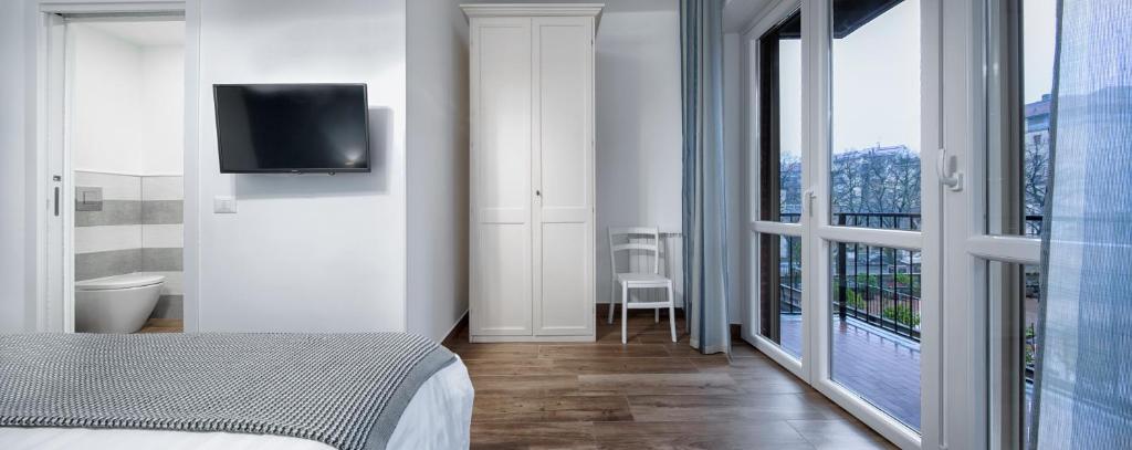 Postel nebo postele na pokoji v ubytování B&B Campari 10