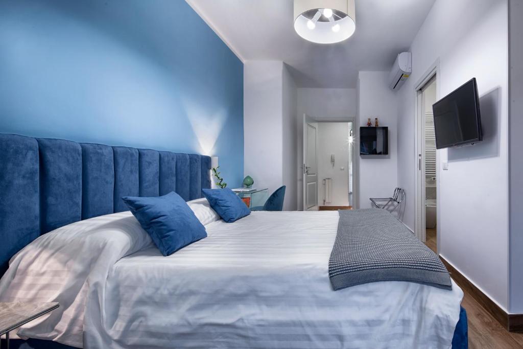 Postel nebo postele na pokoji v ubytování B&B Campari 10