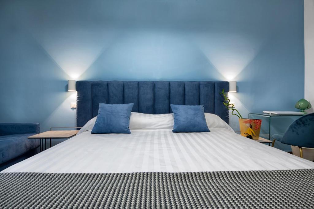 Postel nebo postele na pokoji v ubytování B&B Campari 10