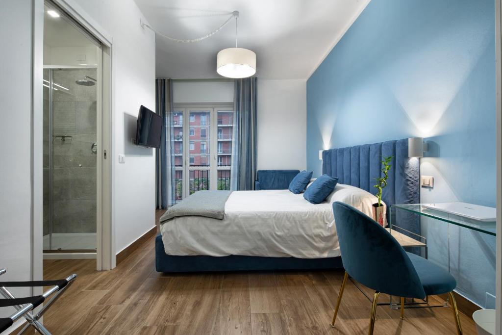 Postel nebo postele na pokoji v ubytování B&B Campari 10