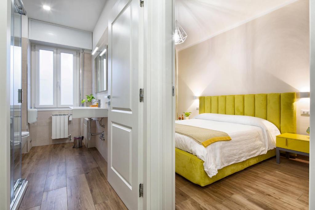 Postel nebo postele na pokoji v ubytování B&B Campari 10
