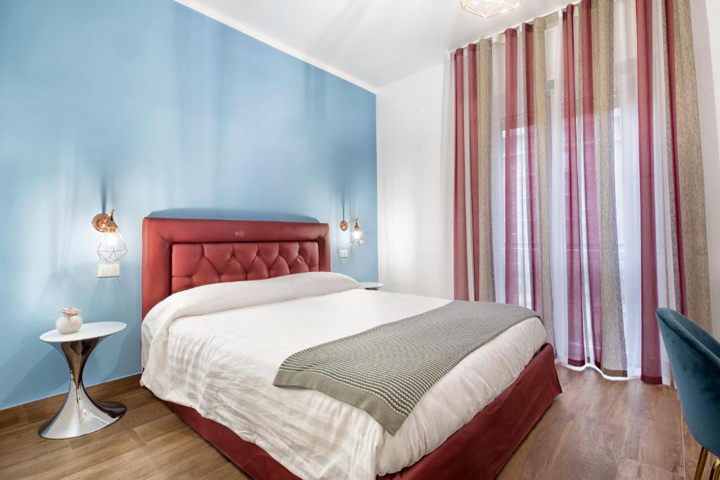 Postel nebo postele na pokoji v ubytování B&B Campari 10