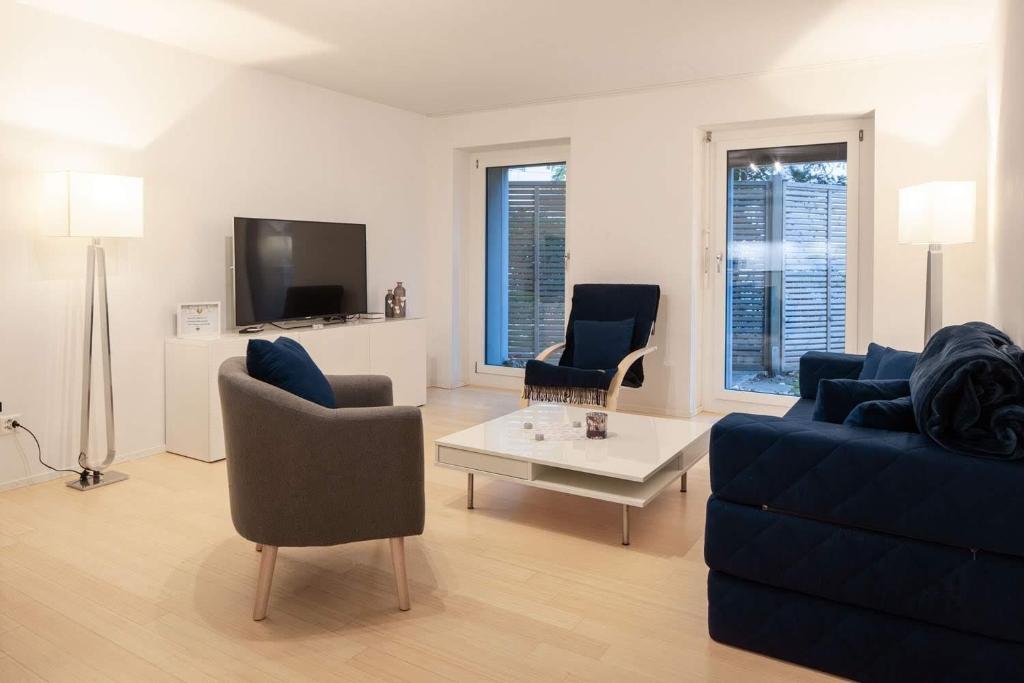 TV a/nebo společenská místnost v ubytování 2,5 Zi Design Loft Wohnung mit Gartensitzplatz