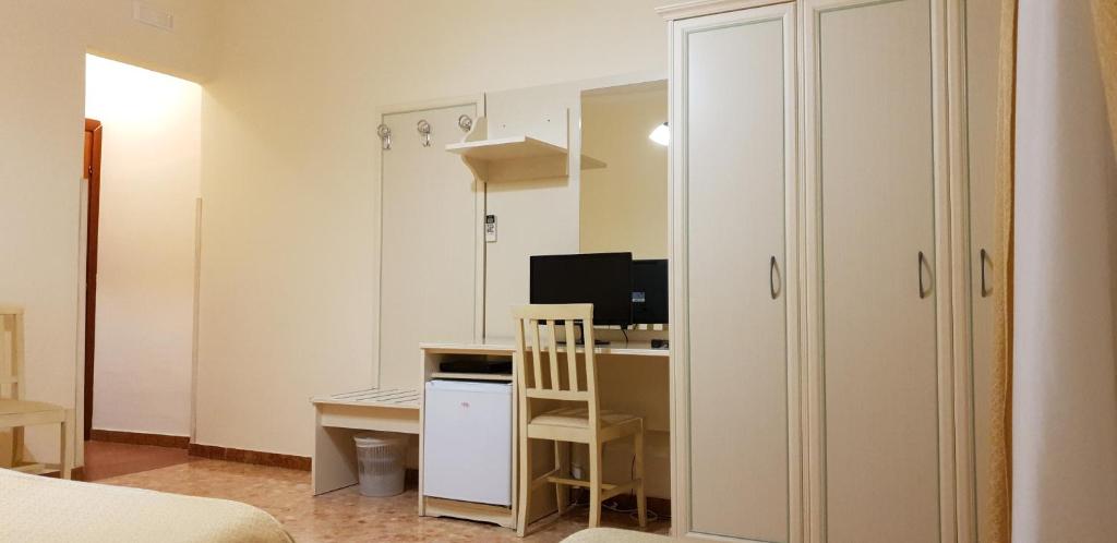 Łóżko lub łóżka w pokoju w obiekcie RS San Sebastiano Holidays