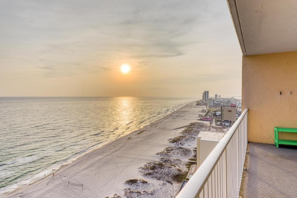 a balcony with a view of the beach and the ocean at San Carlos #1808 in Gulf Shores