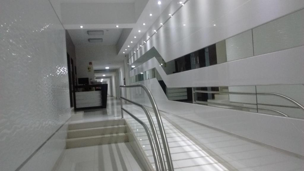 a hallway with stairs in a building at Apartamento completo en centro historico in Lima