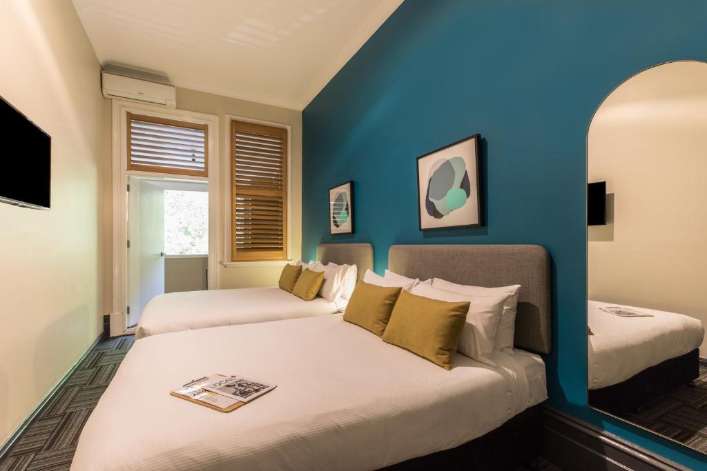 
Quadruple Room with Balcony + Shared Bathroom
