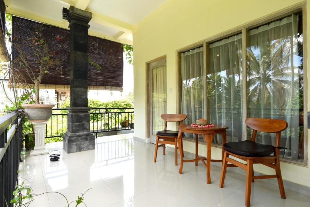 Balkón nebo terasa v ubytování Vinayaka Ubud