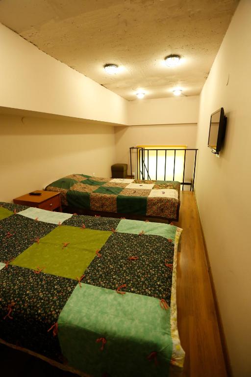 Postel nebo postele na pokoji v ubytování Araks Hotel Complex