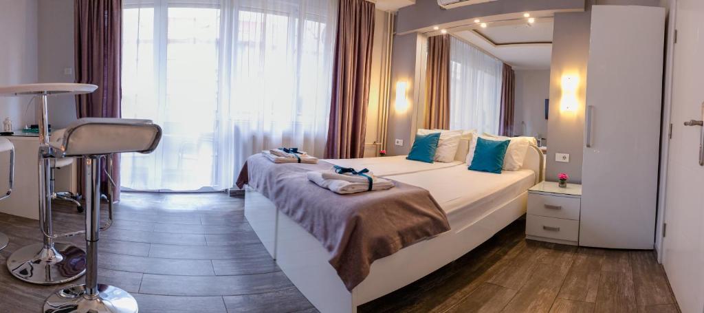 Postel nebo postele na pokoji v ubytování SPA Apartment Nalis
