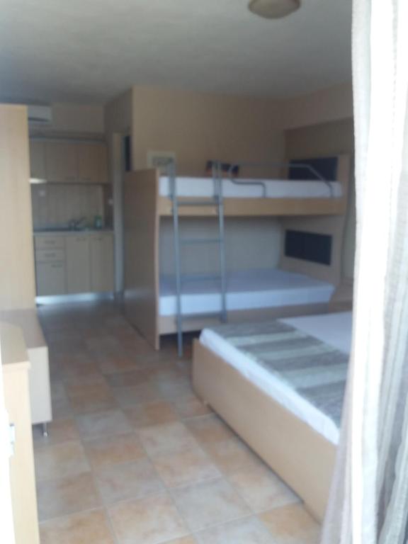 Postel nebo postele na pokoji v ubytování House Meltemi