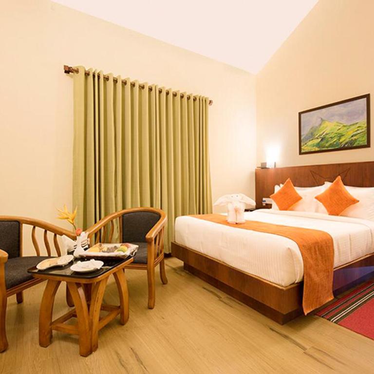 Postel nebo postele na pokoji v ubytování Indeevara Luxury Resort and Spa, Wayanad