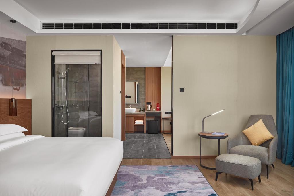 Postel nebo postele na pokoji v ubytování Aurea Central Hotel