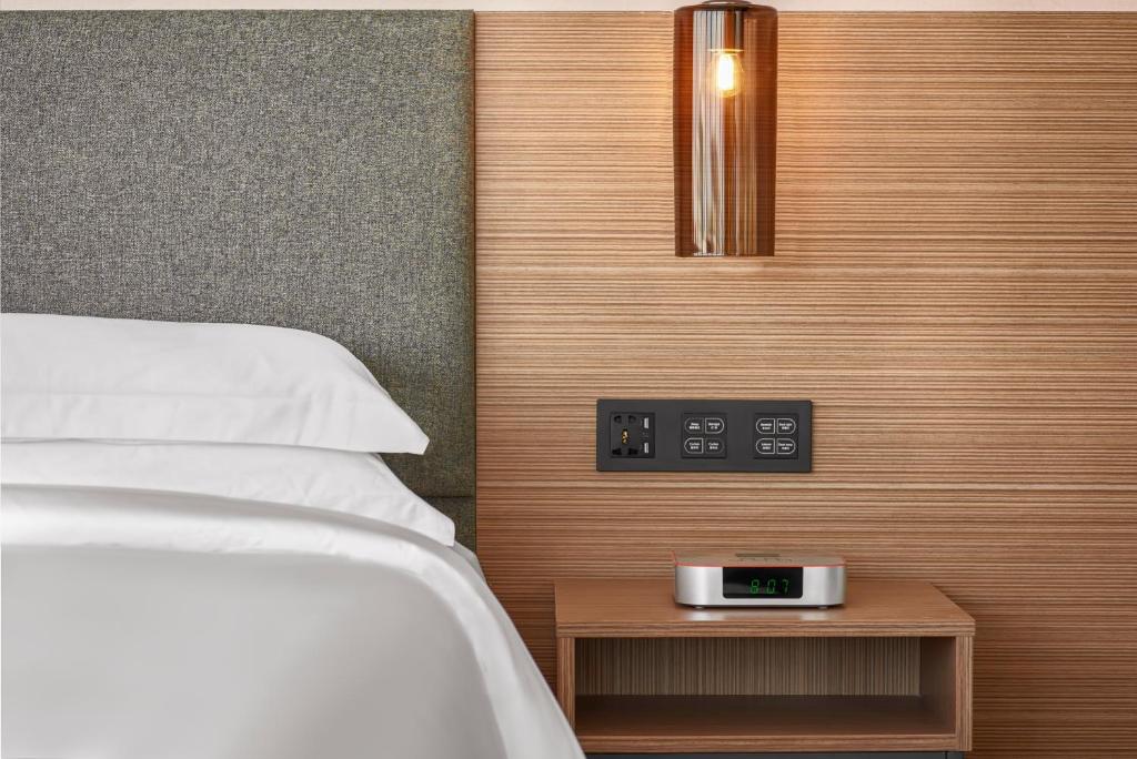 Postel nebo postele na pokoji v ubytování Aurea Central Hotel