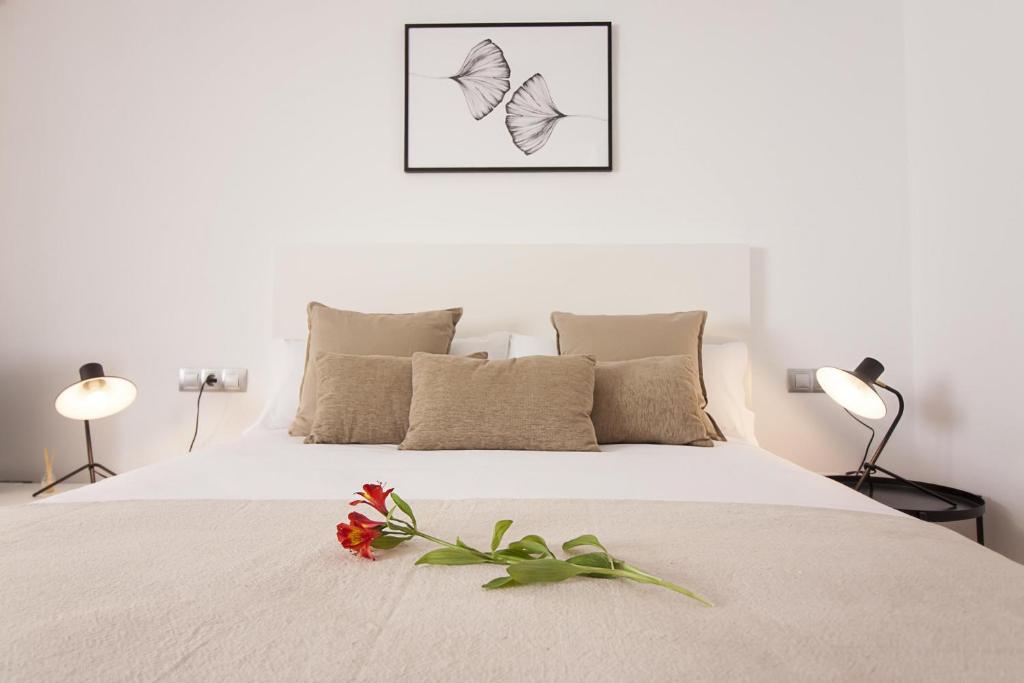 Posteľ alebo postele v izbe v ubytovaní Teatro Suites Málaga CITY FLAT