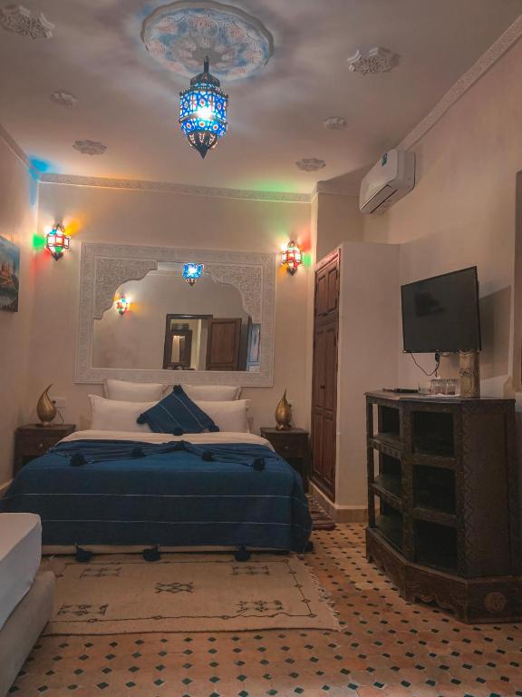 Postel nebo postele na pokoji v ubytování Riad Ghali Hotel & SPA