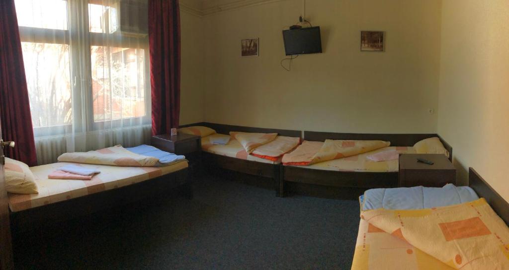 Postel nebo postele na pokoji v ubytování Guesthouse Duga