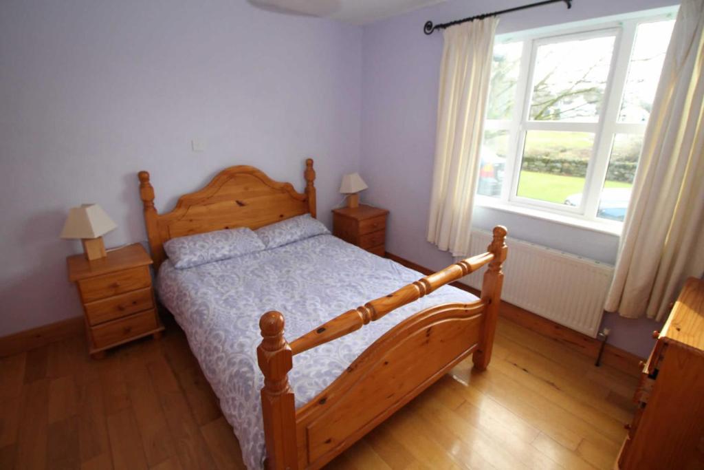 Postel nebo postele na pokoji v ubytování Rathmullan Holiday Homes