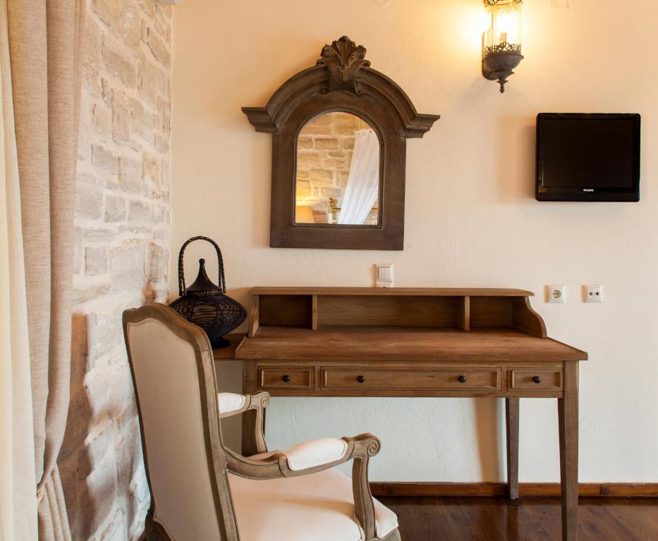 TV a/nebo společenská místnost v ubytování Eleon Residence