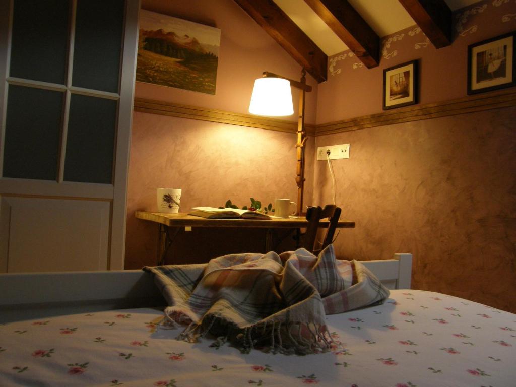 Postel nebo postele na pokoji v ubytování Chalet Rural El Encanto