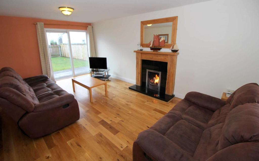 Posezení v ubytování Rathmullan Holiday Homes