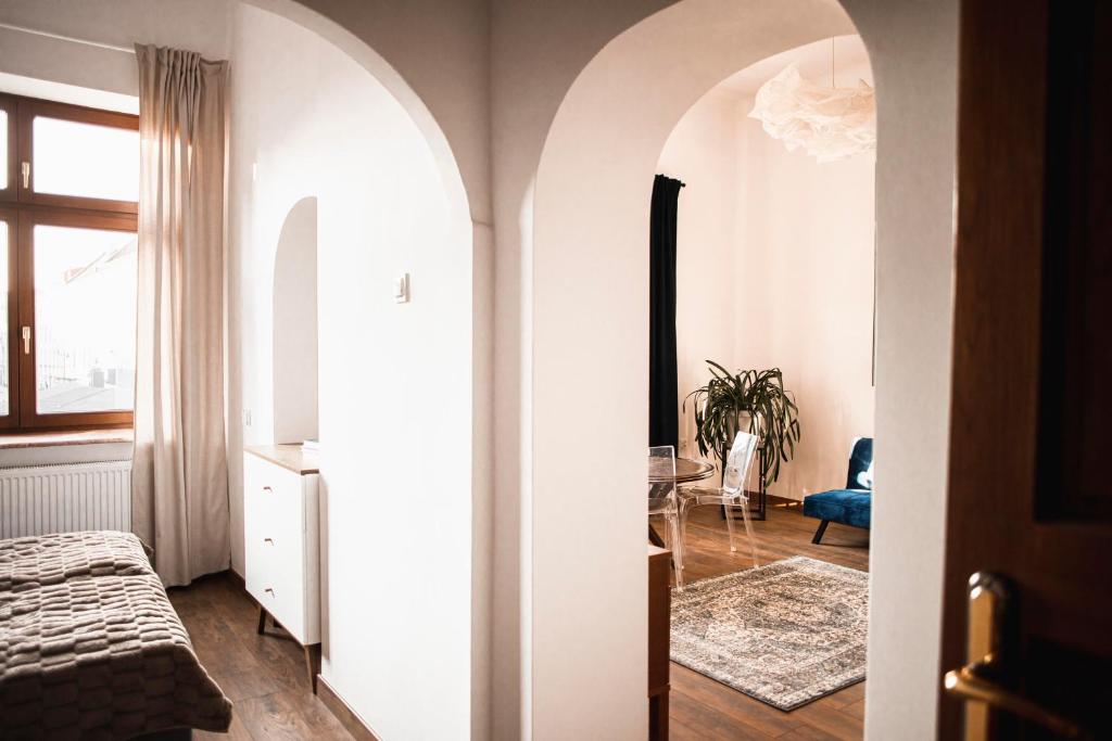 Posteľ alebo postele v izbe v ubytovaní Vilao Apartments