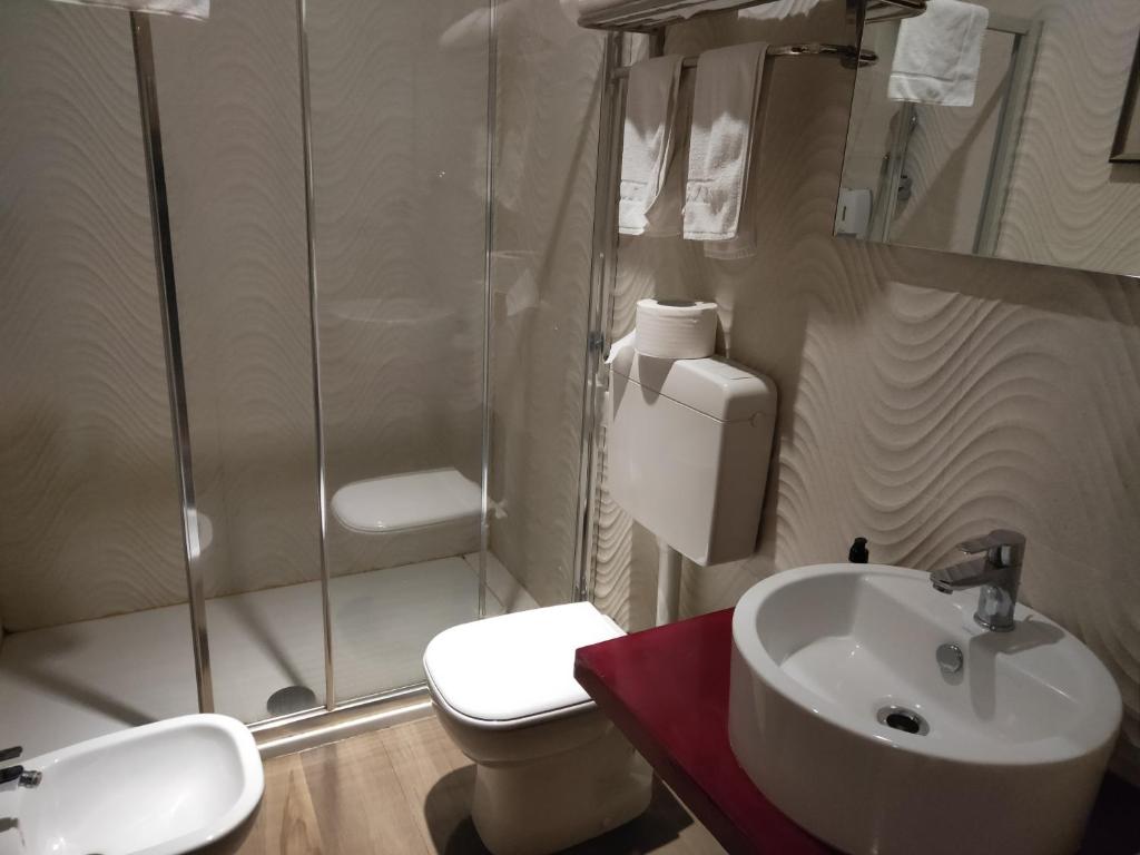 Koupelna v ubytování Igiban Hotel