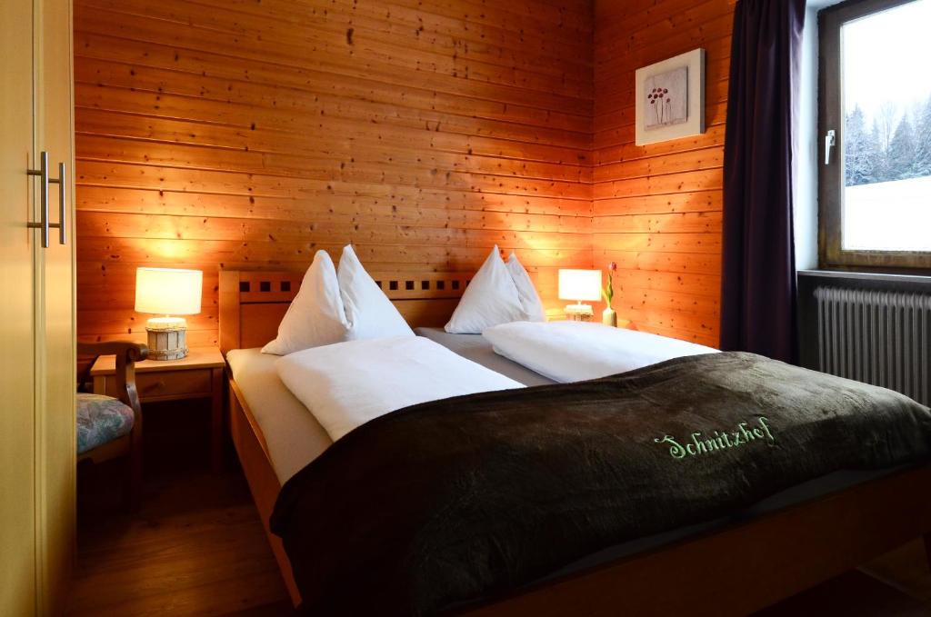 Postel nebo postele na pokoji v ubytování Ferienhaus Schnitzhof